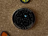 Dust Mote in a Sunbeam (pin badge)